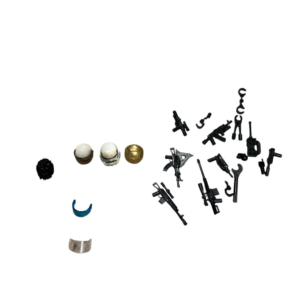 Various mini Fig Size‎ weapons and Lego Helmets and Visors